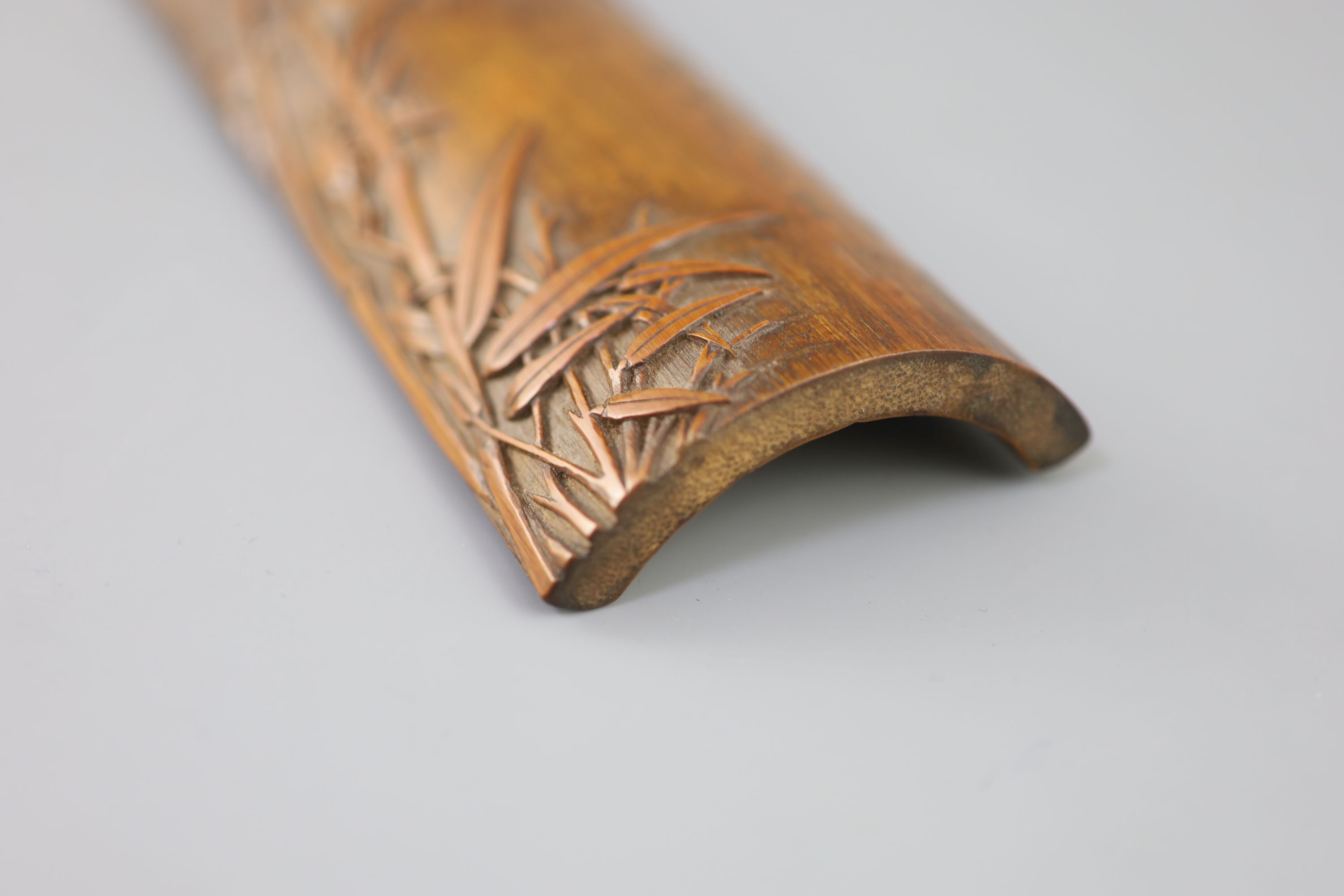A Chinese bamboo bamboo sprig wrist rest, 18th century,